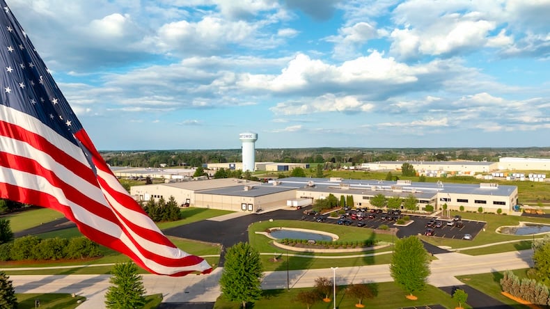 american-flag-over-manitowoc-wisconsin-production-facility